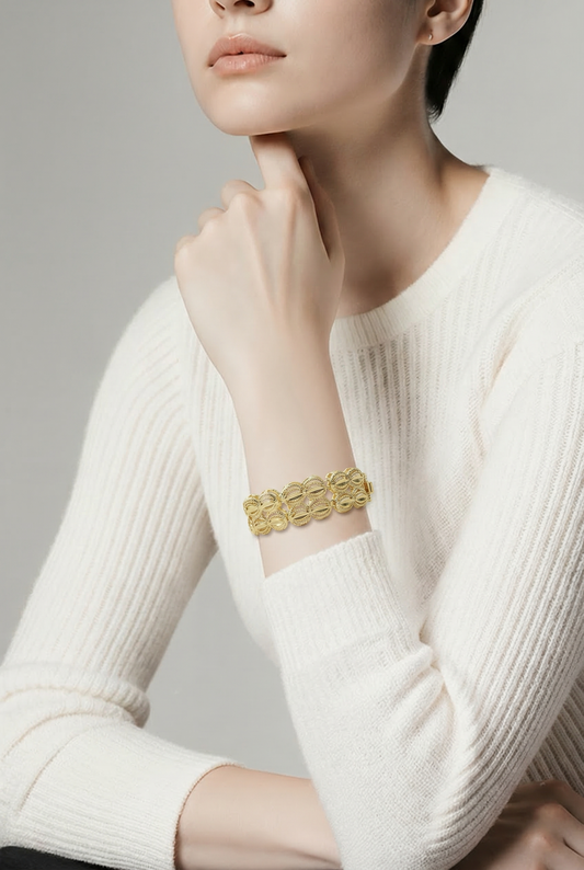 Gold-plated bracelet with circles.
